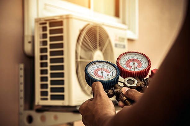 Professional Hvac technician working in Tad, WV
